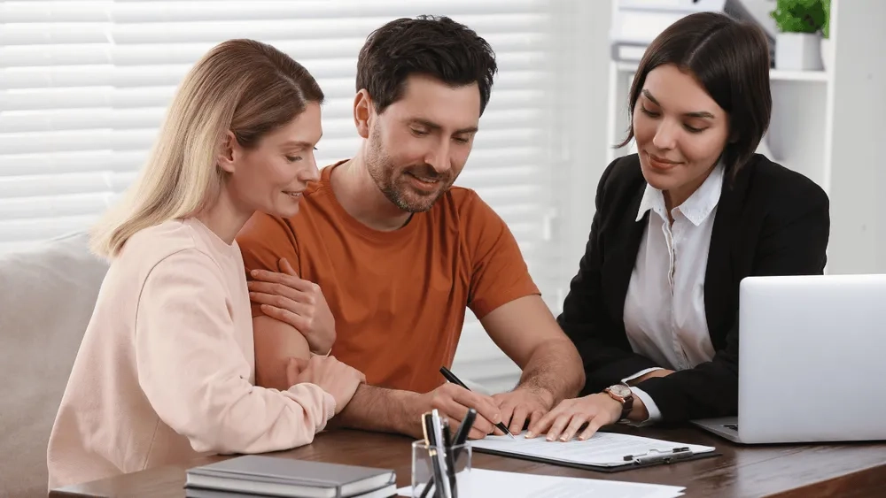 Homeowner reviewing cash out refinance options with a loan advisor