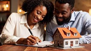 "Advisor guiding a buyer through down payment assistance eligibility and documentation"